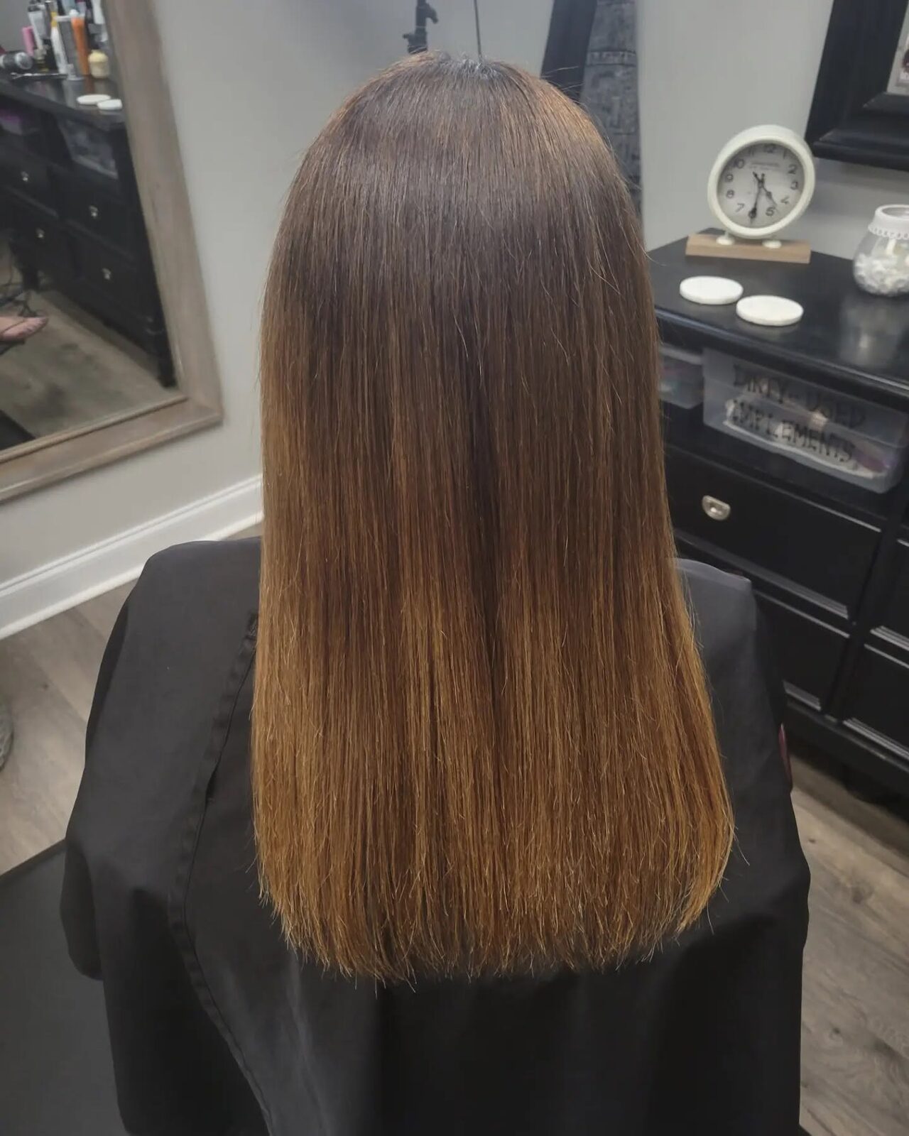 Sleek brunette color melt with caramel ends by Amanda Green