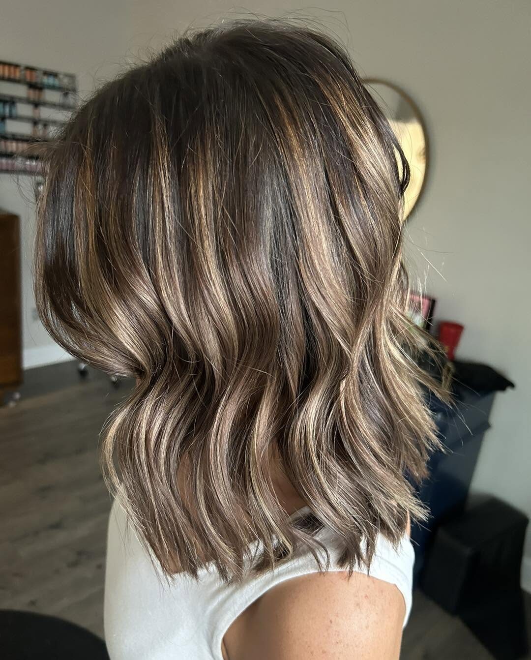 Brunette balayage lob with caramel highlights