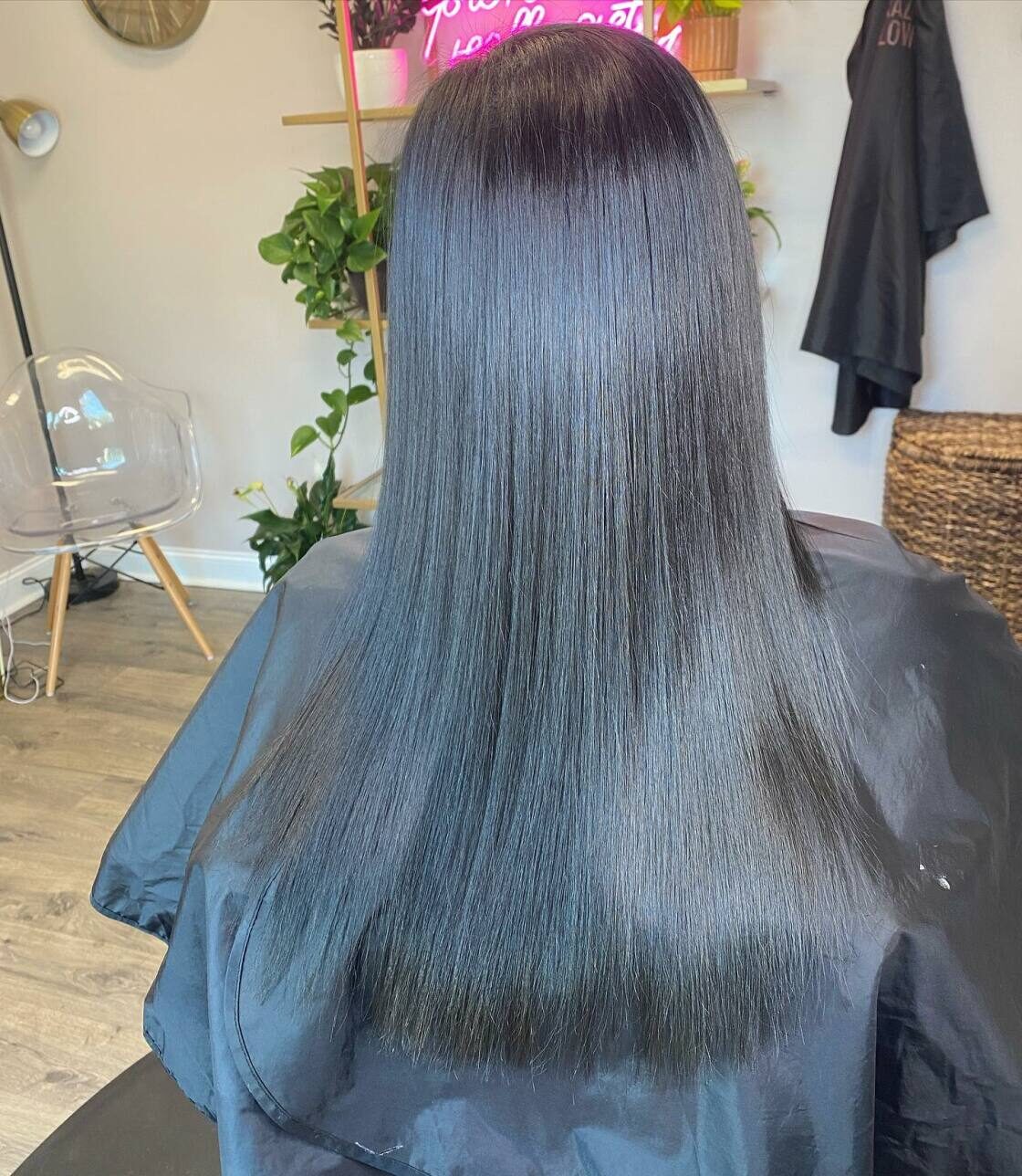 Sleek, glassy straight dark hair by Emma Howell