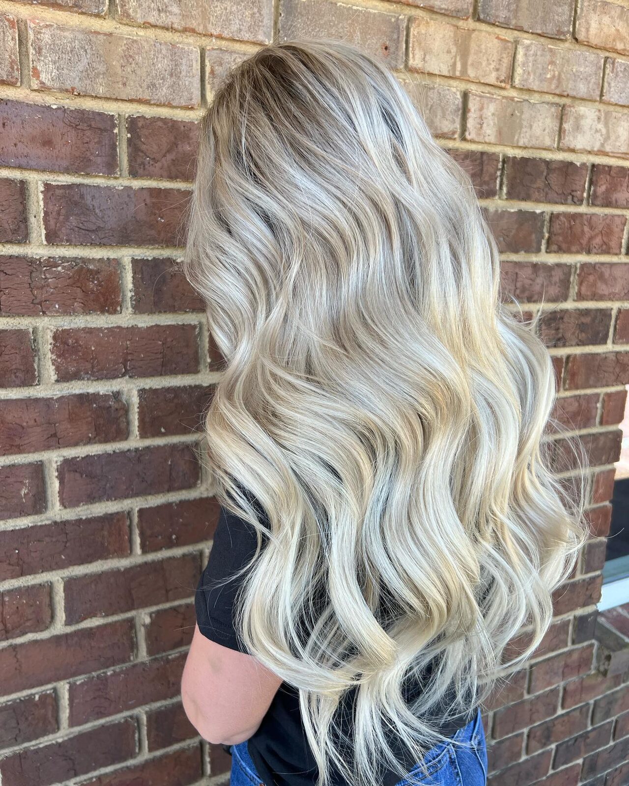 Long buttery blonde balayage by Natalie Marie
