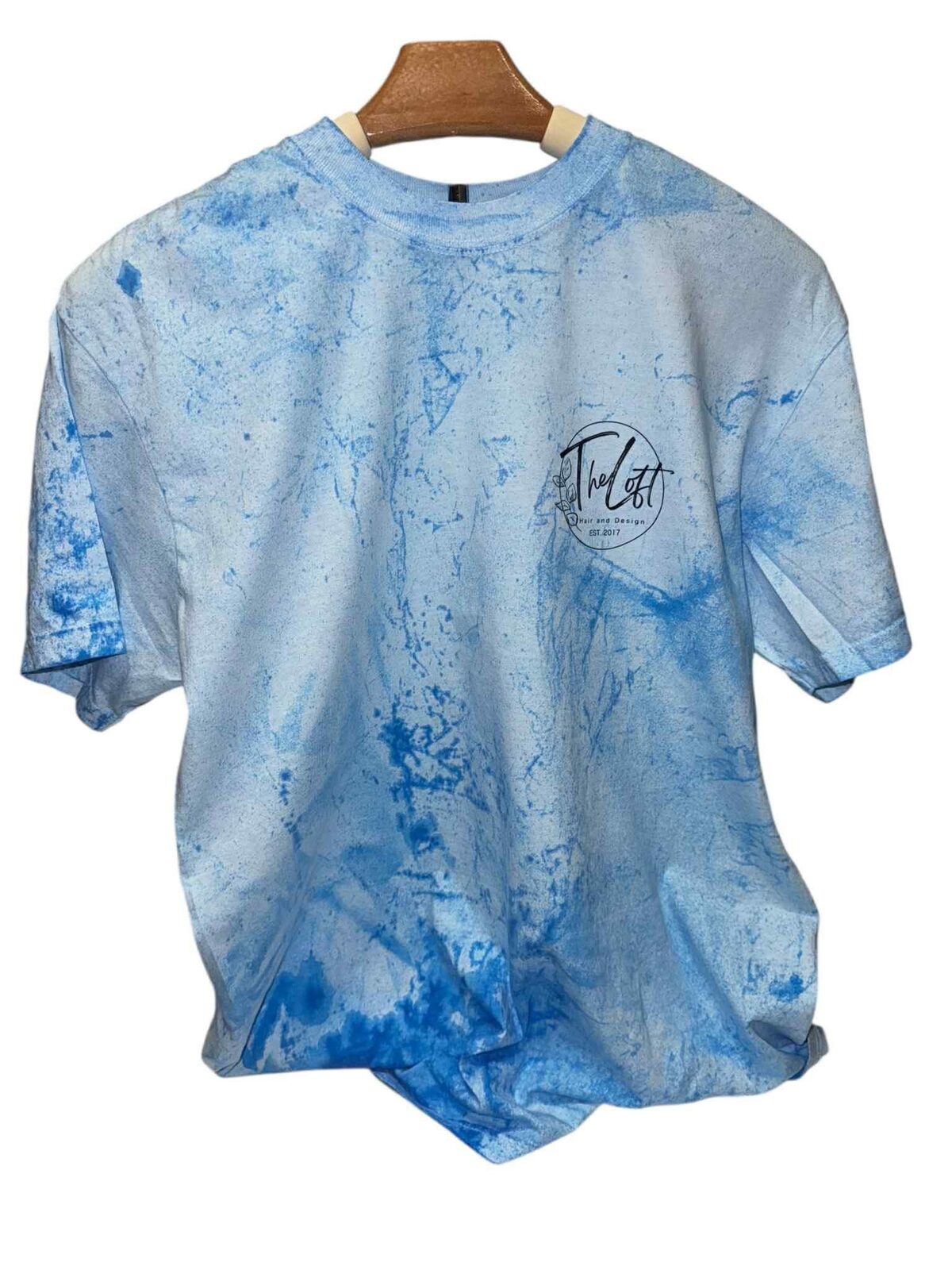 Blue mineral-wash Loft tee with navy chest logo